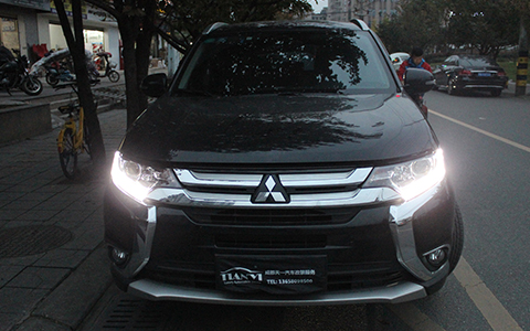 成都三菱歐藍(lán)德車燈改裝升級